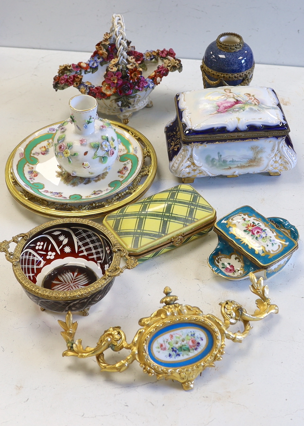 A collection of European porcelain and glass, including lidded boxes, ormolu mounted glass plates, dishes, etc. (10)